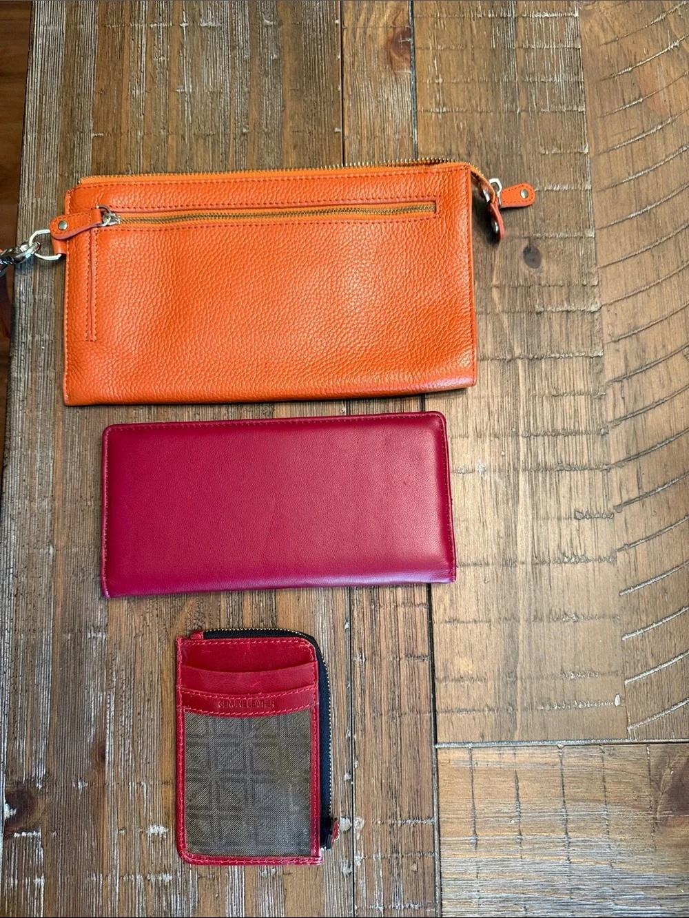 Rowallan Orange Pebbled Leather Zip Wristlet with Gold Plaque